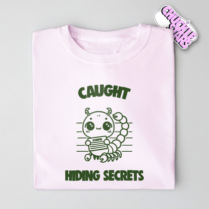 Caught Hiding Secrets Scorpio Zodiac Tee